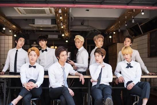 PURE BOY, PURE BOY group photo debut lineup 2014, PURE BOY Yellow Shirt debut single cover, PURE BOY members Sangmin profile photo, PURE BOY members Jiho stage performance, PURE BOY White Snow mini album cover, PURE BOY Japanese debut LOVE x EVOL, PURE BOY members Seokyu Produce 101, PURE BOY group concert in Japan, PURE BOY members NTB redebut, PURE BOY fandom Diamond logo,